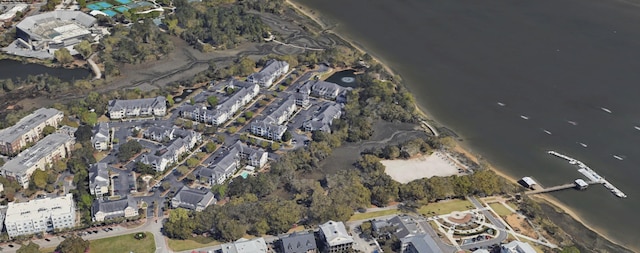 bird's eye view with a water view