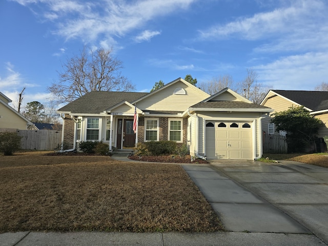 single story home with a garage and a front yard