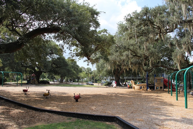 view of home's community with a playground