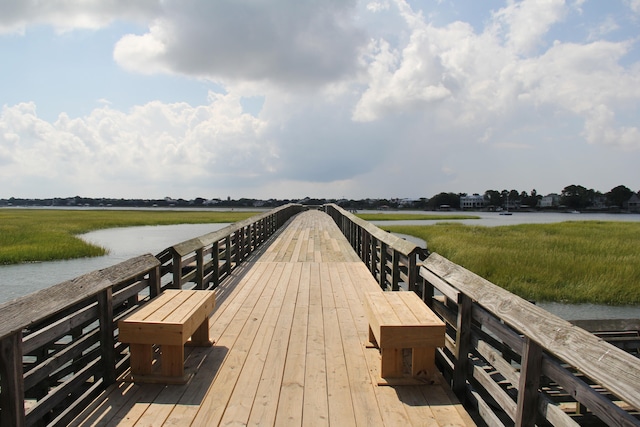 dock area with a water view