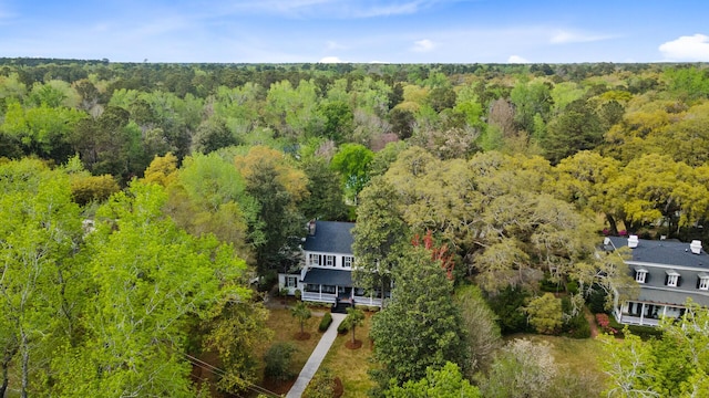 aerial view featuring a view of trees
