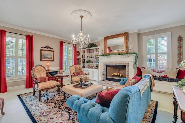 carpeted living room featuring a notable chandelier, plenty of natural light, and a fireplace