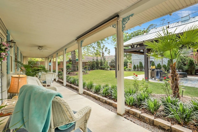 view of patio / terrace featuring ceiling fan