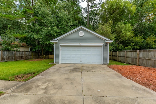 garage with a lawn