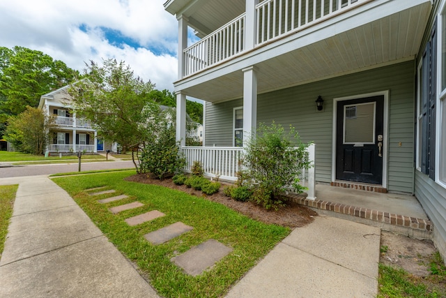 doorway to property with covered porch