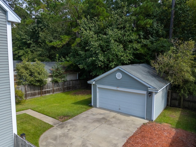 garage with a lawn