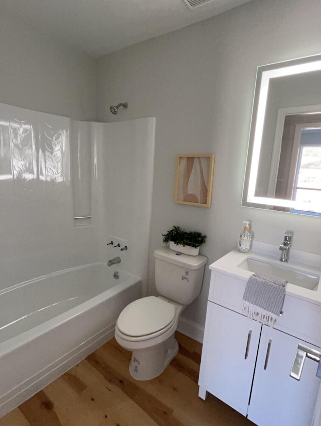 222 Braly Dr, Summerville, SC 29485 - full bathroom with hardwood / wood-style flooring, vanity, toilet, and shower / bathing tub combination