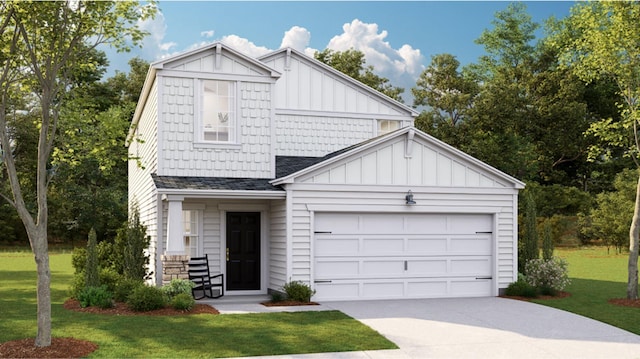 view of front of house with a garage and a front yard