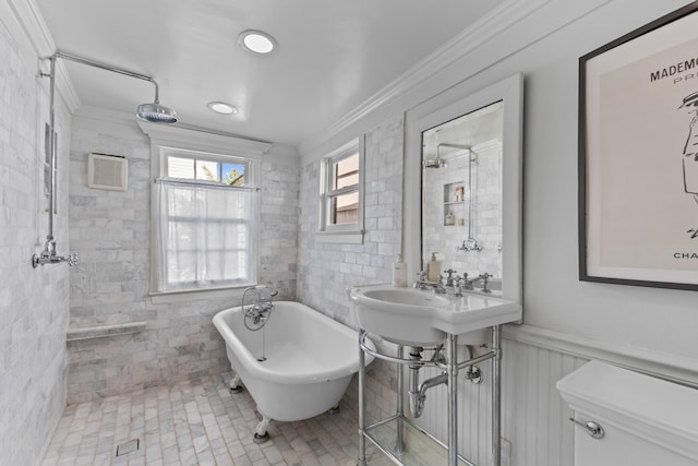 176 Smith St, Charleston, SC 29403 - bathroom with crown molding, a freestanding bath, and wainscoting