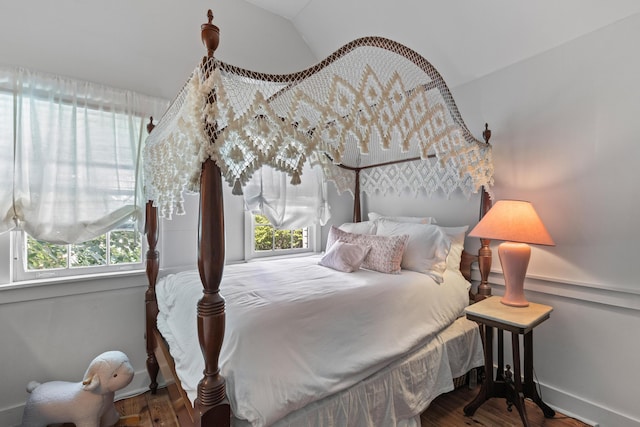 176 Smith St, Charleston, SC 29403 - bedroom with wood finished floors and vaulted ceiling