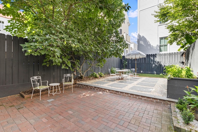 176 Smith St, Charleston, SC 29403 - fenced backyard featuring a patio and outdoor dining space