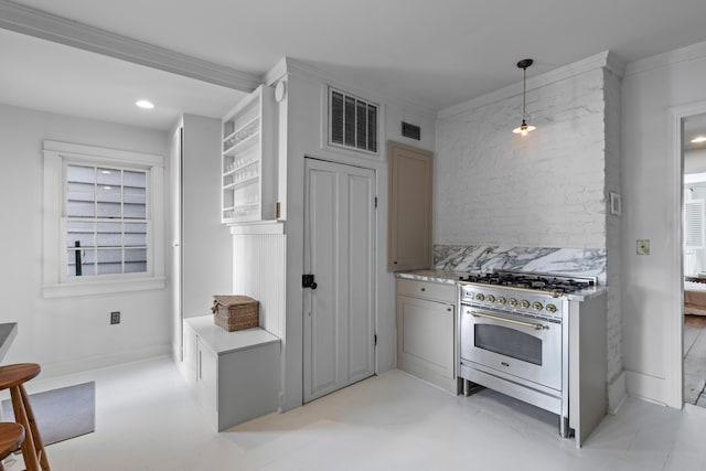 176 Smith St, Charleston, SC 29403 - kitchen with stainless steel stove, crown molding, light countertops, gray cabinets, and pendant lighting