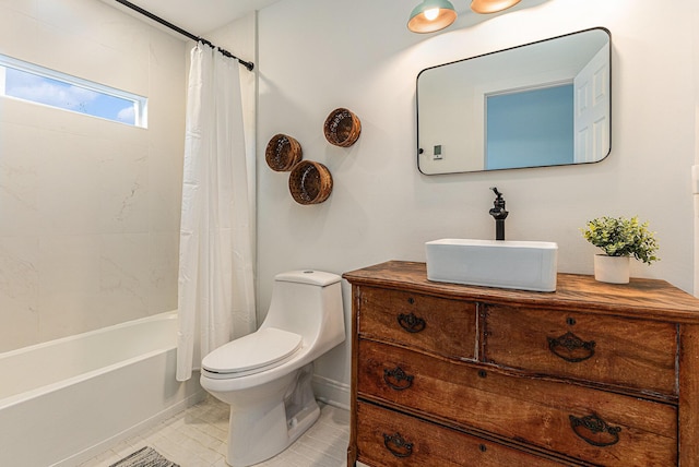 full bathroom featuring shower / bath combo, toilet, and sink