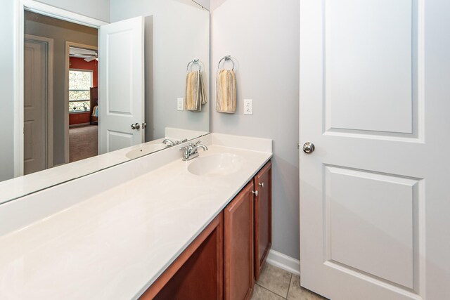 bathroom with vanity, ceiling fan, and tile patterned floors