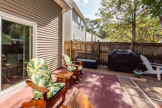 view of patio with a grill