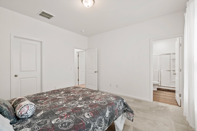 309 Sedona Dr, Summerville, SC 29486 - bedroom featuring carpet flooring, connected bathroom, and baseboards