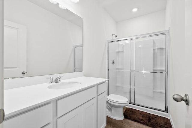 309 Sedona Dr, Summerville, SC 29486 - bathroom featuring a shower stall, wood finished floors, toilet, and vanity