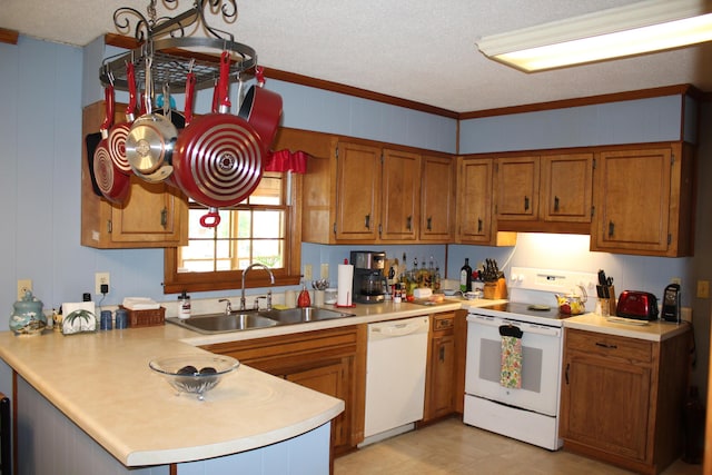 carpeted living room with ceiling fan, ornamental molding, and a textured ceiling