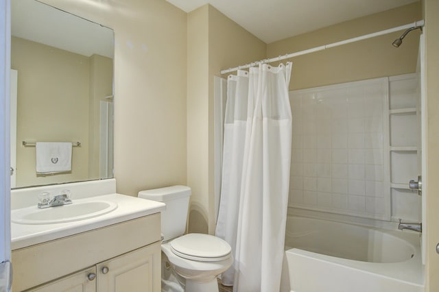 full bathroom with toilet, vanity, and shower / bath combination with curtain