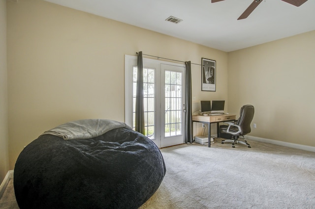 carpeted bedroom with ceiling fan and access to exterior