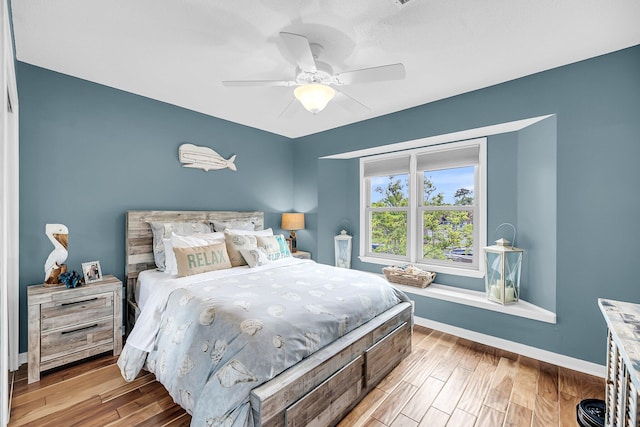 166 River Breeze Dr, Charleston, SC 29407 - bedroom with light wood-style flooring, baseboards, and ceiling fan