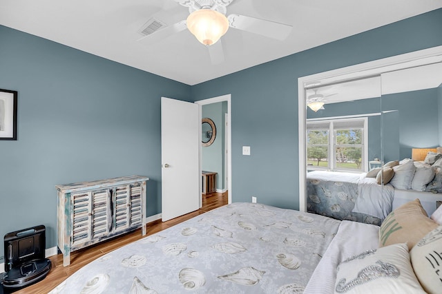 166 River Breeze Dr, Charleston, SC 29407 - bedroom featuring wood finished floors, a closet, ceiling fan, and baseboards