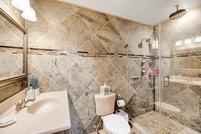 166 River Breeze Dr, Charleston, SC 29407 - full bathroom with vanity, a shower stall, toilet, and tile walls