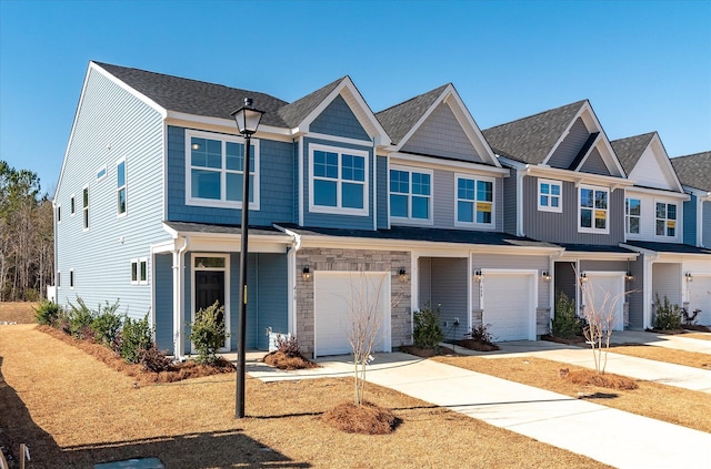 view of front of property featuring a garage