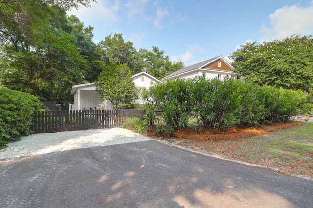 1151 Camellia Dr, Mount Pleasant, SC 29464 - view of home's exterior with a fenced front yard and driveway