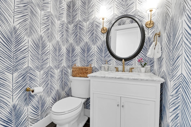 1151 Camellia Dr, Mount Pleasant, SC 29464 - bathroom featuring wallpapered walls, toilet, and vanity