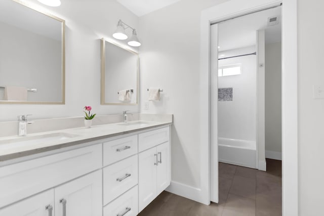 1151 Camellia Dr, Mount Pleasant, SC 29464 - full bathroom featuring double vanity, baseboards, tile patterned floors, and shower / bathtub combination