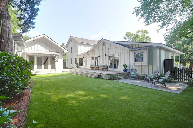 1151 Camellia Dr, Mount Pleasant, SC 29464 - back of property with french doors, board and batten siding, and a wooden deck