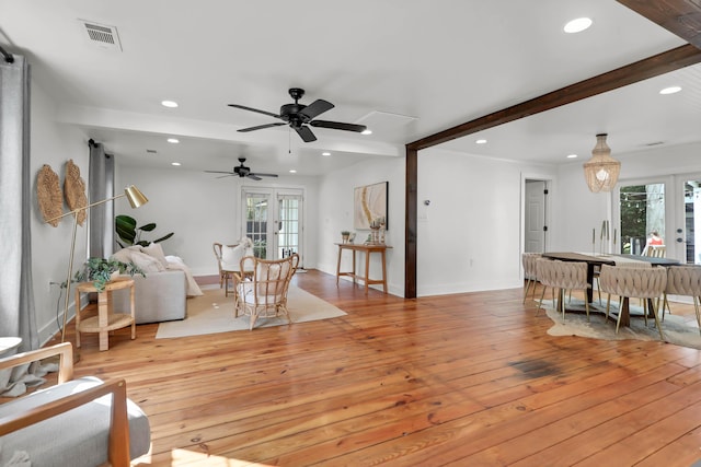 1151 Camellia Dr, Mount Pleasant, SC 29464 - living area with light wood finished floors, a ceiling fan, recessed lighting, beamed ceiling, and baseboards