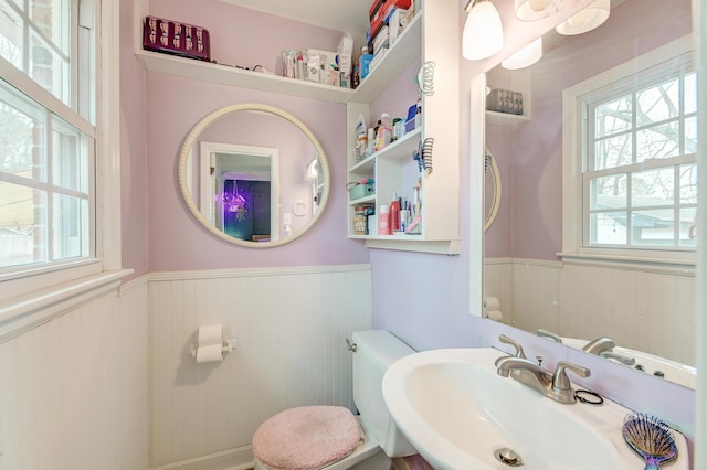 bathroom featuring sink and toilet