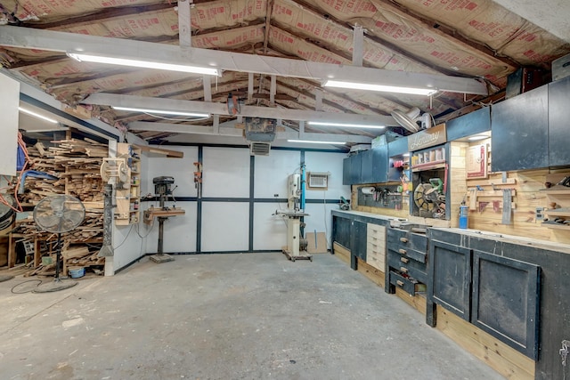 interior space featuring a workshop area