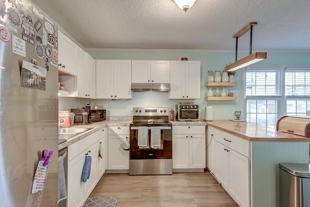 kitchen with white cabinetry, stainless steel electric range, light hardwood / wood-style flooring, and decorative light fixtures