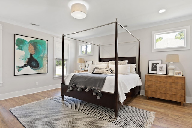 2828 Wagner Way, Mount Pleasant, SC 29466 - bedroom featuring ornamental molding, baseboards, and light wood-style flooring