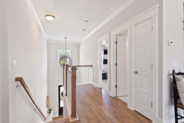 2828 Wagner Way, Mount Pleasant, SC 29466 - hall featuring an upstairs landing, hardwood / wood-style floors, ornamental molding, and baseboards