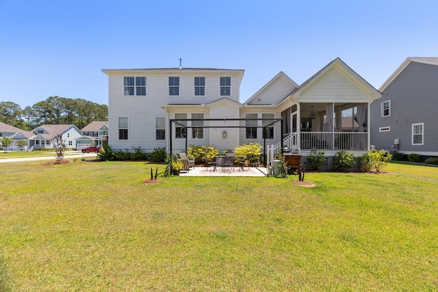 2828 Wagner Way, Mount Pleasant, SC 29466 - back of property featuring a sunroom, a patio area, and a yard