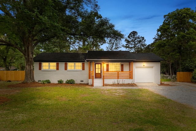 single story home featuring gravel driveway, a garage, crawl space, and brick siding