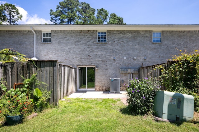 507 Stinson Dr Unit E8, Charleston, SC 29407 - back of property featuring brick siding and a patio