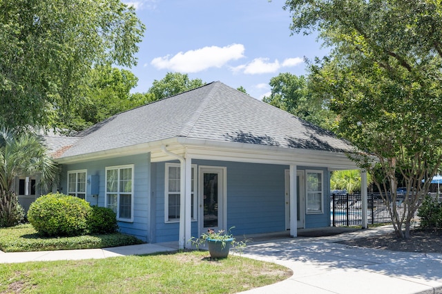 507 Stinson Dr Unit E8, Charleston, SC 29407 - view of front of home featuring a shingled roof, concrete driveway, and an attached carport