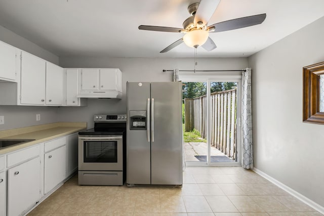 507 Stinson Dr Unit E8, Charleston, SC 29407 - kitchen featuring stainless steel appliances, under cabinet range hood, ceiling fan, white cabinets, and light tile patterned floors