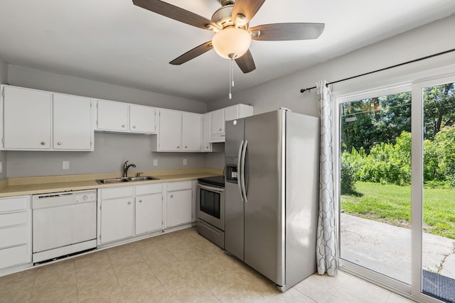 507 Stinson Dr Unit E8, Charleston, SC 29407 - kitchen with stainless steel appliances, light countertops, white cabinetry, ceiling fan, and light tile patterned flooring