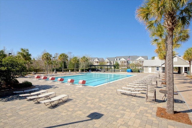 view of swimming pool featuring a patio