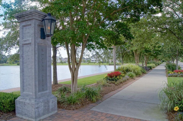 view of community featuring a water view