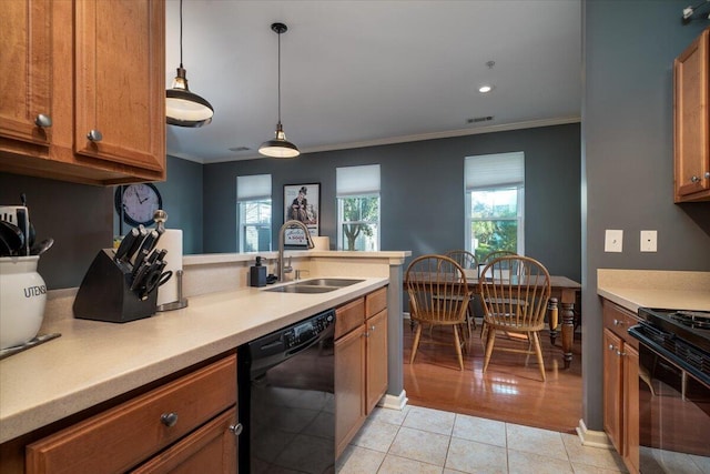 kitchen featuring sink, crown molding, hanging light fixtures, light tile patterned floors, and black appliances