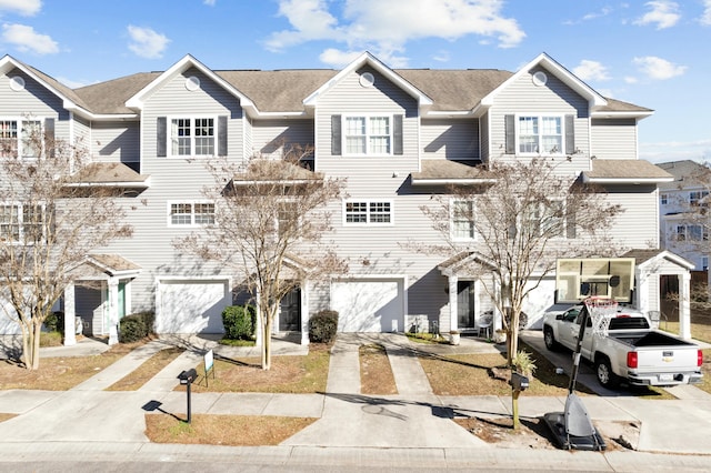 view of property featuring a garage