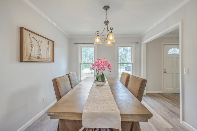 103 Laurens Ct, Summerville, SC 29485 - dining room featuring light wood-style flooring, ornamental molding, and a chandelier