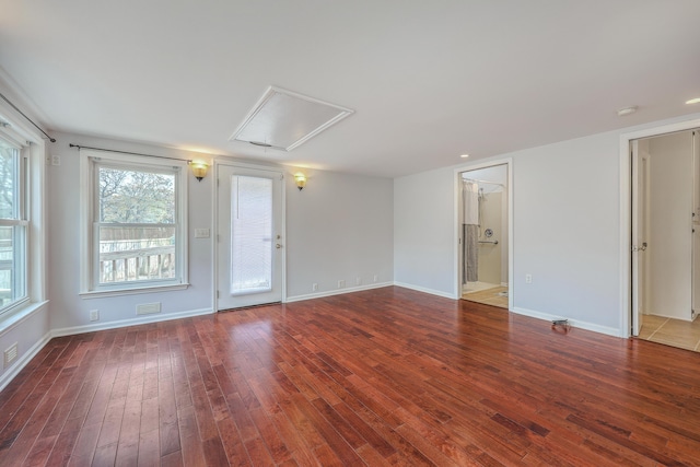 103 Laurens Ct, Summerville, SC 29485 - spare room featuring baseboards, attic access, and hardwood / wood-style floors